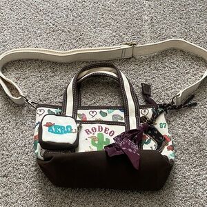 Rodeo Printed Canvas and Brown Trim Crossbody Bag